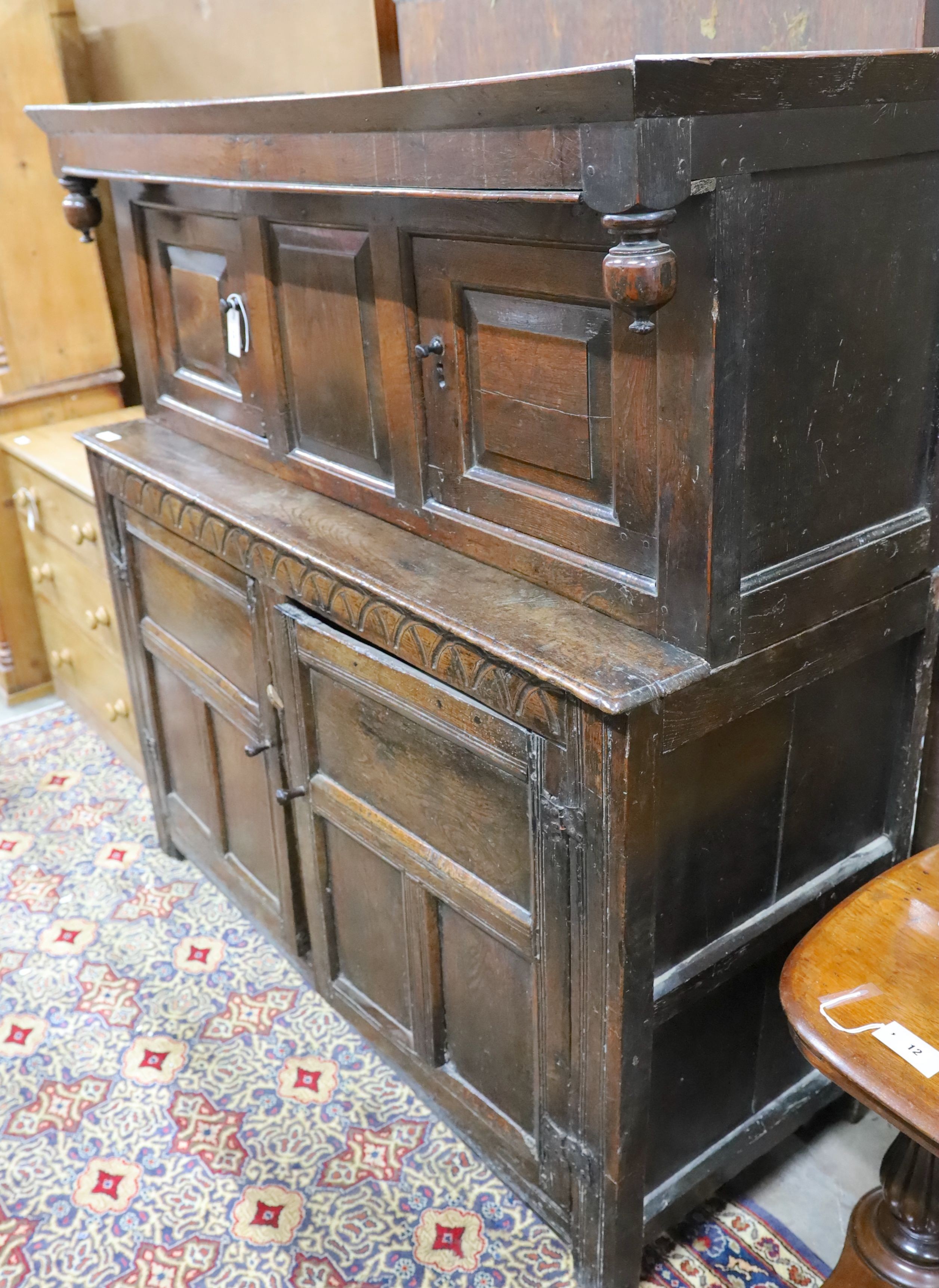 An 18th century oak court cupboard, length 147cm, depth 58cm, height 152cm